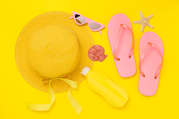 istock Flat lay with colorful beach accessories on color background. Vacation concept 2257625778