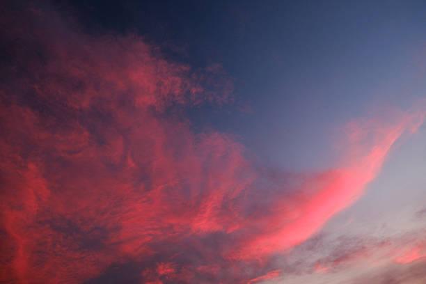 Purple clouds in the evening sky background.