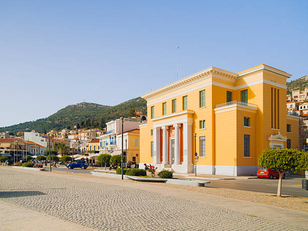 A tranquil view of the Aegean coastline on Samos Island, Greece, featuring clear blue sea, natural shoreline, and Mediterranean summer atmosphere.