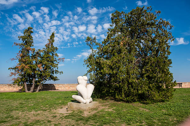 Naxos, Greece - September 20, 2024: The ancient marble statue Ariadne - a love story of Greek mythology with god Dionysus on the causeway to the islet Palatia where the remains of the Apollo temple are