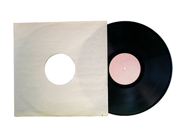 A black vinyl record with a blank label partially removed from its plain white paper sleeve, isolated on a white background. A minimalistic and nostalgic music concept