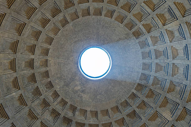 istock Italy - Rome - Pantheon - Ancient coffered dome reveals perfect geometric pattern around central oculus opening to celestial light 2257680546