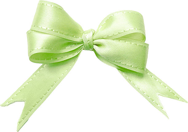 Green gift bows making a cheerful seamless pattern on a light background