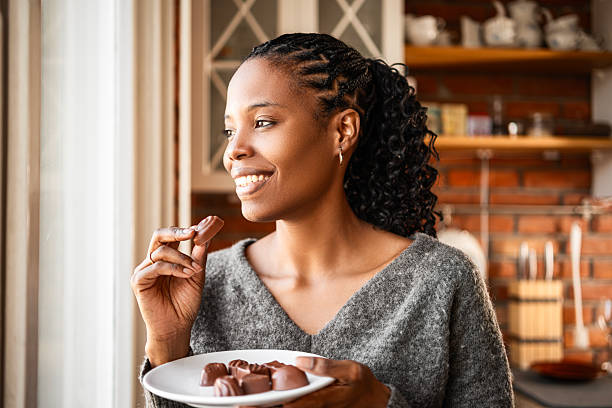 Relaxed Home Lifestyle with Woman Eating Candy