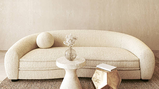 istock Textured comfort meets modern design. A curvaceous sofa paired with unique accent pieces in a 3d render contemporary living room setting 2257754833
