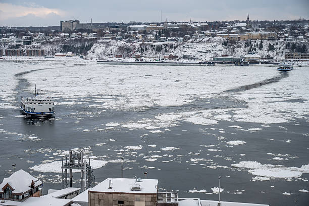 ice sculptures on the river in the winter in sub zero temperatures, splashing down a small rivulet.