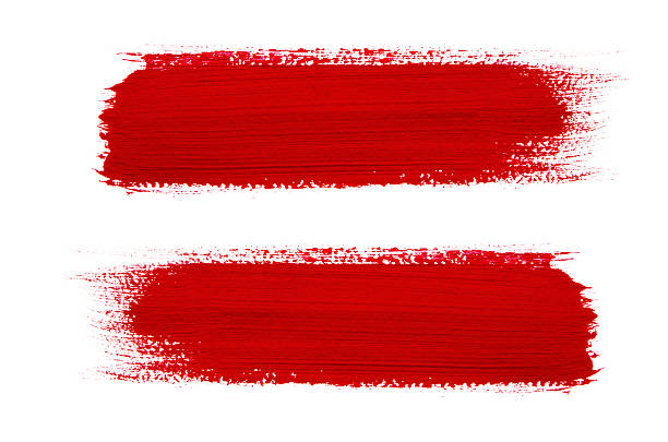 Red paint on a paintbrush isolated on white background