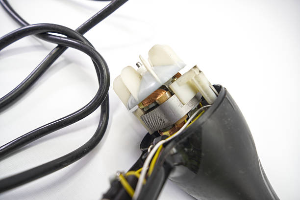 istock Handheld hair dryer under repair and disassembled 2257765131