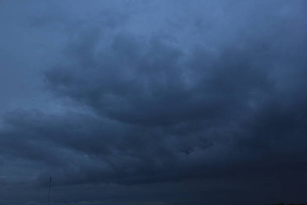 A Prairie storm clouds and setting sun.