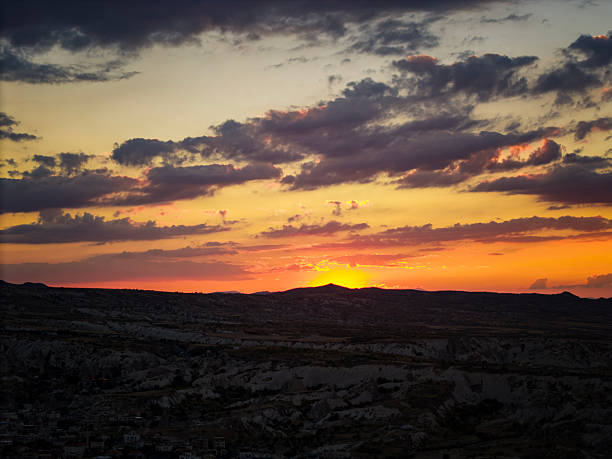 Radiant Golden Clouds at Sunset Hour