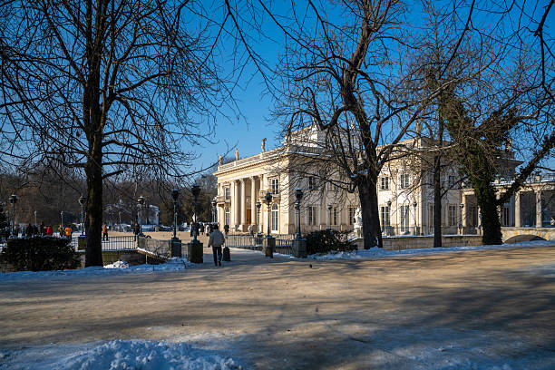 22 January 2026 Warsaw, Poland. Historic Baths Palace with classical columns and rooftop statues seen on a crisp winter day, located in Warsaw’s Royal Baths Park, Poland, a landmark of Polish neoclassical architecture.