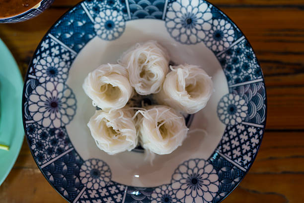 Khanom Chin, also known as Thai Rice Vermicelli or Rice Noodles, is the Thai name for fermented rice vermicelli, a staple food eaten with various curries in Thailand.