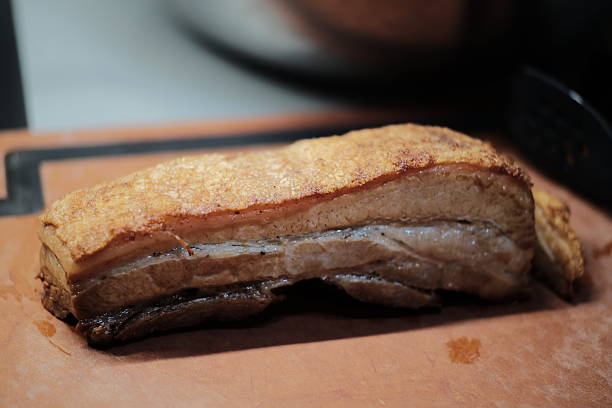 Crispy Roasted Pork Belly (Siu Yuk) On Cutting Board