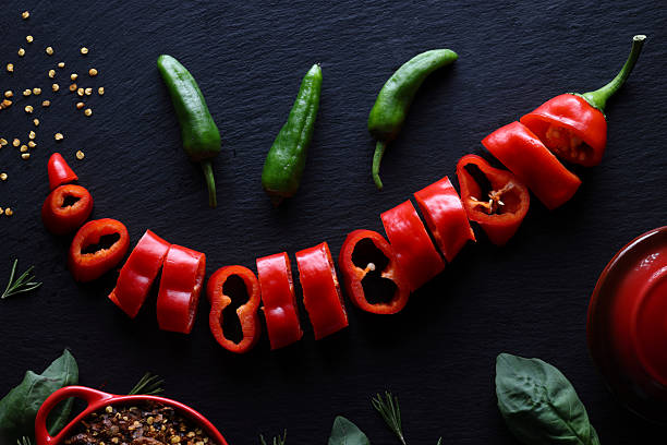 Top view of vegetables on green background in studio photo