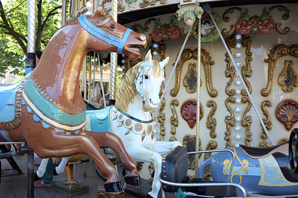 Colorful carousel horses, one brown and one white unicorn, vintage amusement park ride, detailed craftsmanship, playful atmosphere