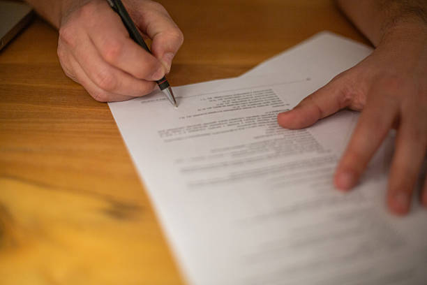 Business contract working hard with document contract at the desk. Justice and legal law concept.