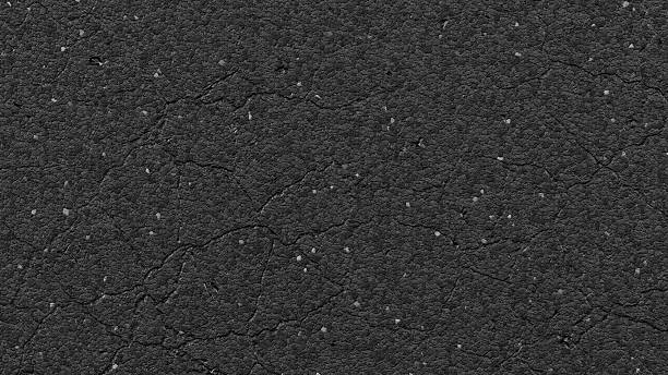 Old white grunge wall background. Distressed concrete surface with heavy peeling paint, cracks and rough texture.
