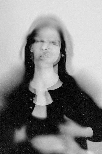 istock Woman experiencing double exposure effect with blurred motion 2257819349