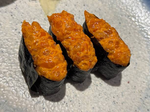Spicy salmon sushi rolls