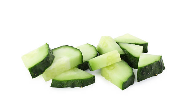 istock Slices of fresh cucumber isolated on white 2257842755