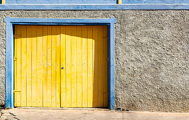 Characteristic yellow door in a house in the Brazilian countryside.