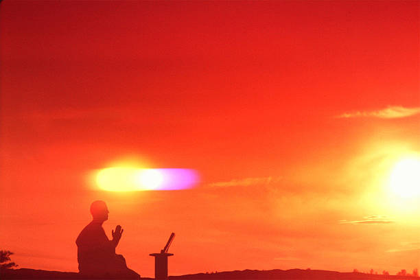 A person deep in solitary enlightenment with the universe.