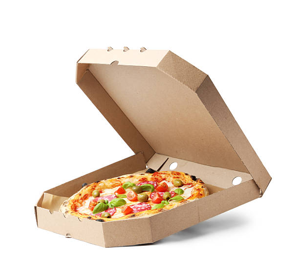 istock Delicious pizza with salami, olives, tomatoes and basil isolated on white 2257853930