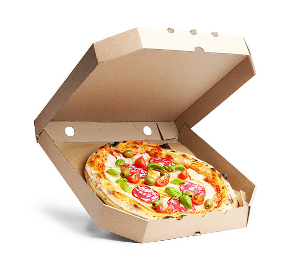 istock Delicious pizza with salami, olives, tomatoes and basil isolated on white 2257853931