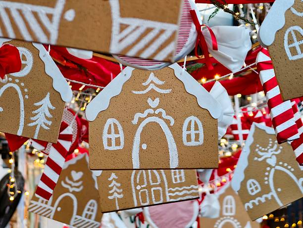 Warm Toned Gingerbread House Tags Featuring Icing Designs And Twine Loops For Holiday Display