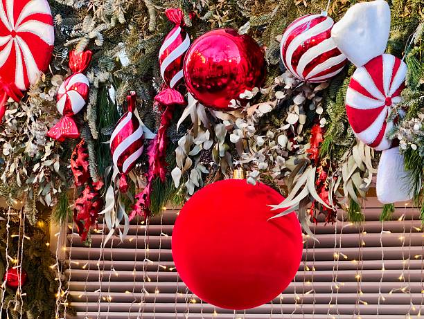 Intricate Closeup Of Festive Wreath Adorned With Shiny Baubles And Dried Decorative Elements