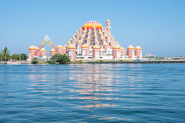 The 99 Domes mosque, officially known as the Asmaulhusna mosque, as seen from Losari beach. This new building is a religious icon located in the Center Point of Indonesia (CPI) reclamation area in Makassar.