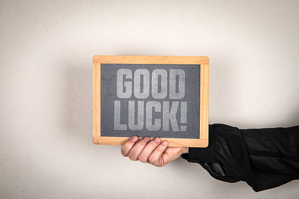 GOOD LUCK Chalkboard Message Held By Hand Conveying Encouragement And Positive Support