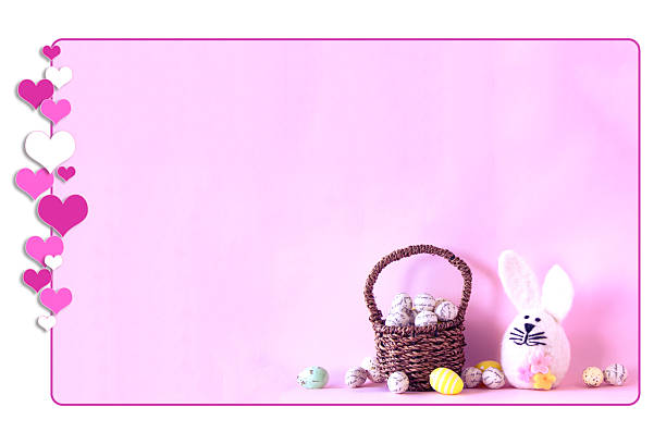 Easter bunny and easter eggs in a basket on pink background. / Hearts frame.