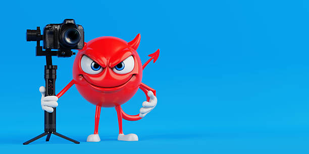 Creative Video Production Concept. Red Devil Cartoon Character Holding Professional Camera On Tripod Gimbal On Blue Background. 3d Rendering