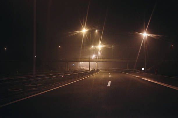 Driving a car on the highway at night, Milos Veiliki highway in Serbia during winter.