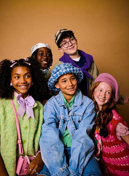 Group of diverse generation alpha children smiling and posing together