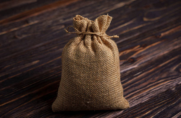 Pouches filled with tulip bulbs for sale in the Amsterdam flower market, Netherlands