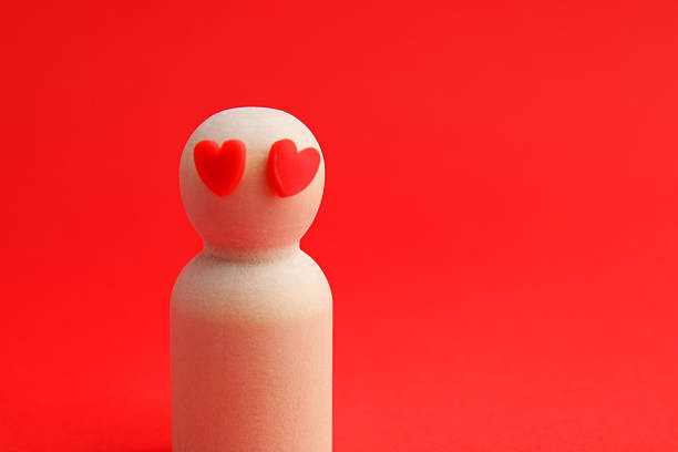 A person expresses their love through their eyes with two hearts