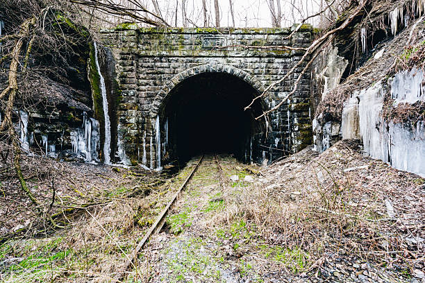 An exterior view of an abandoned brick-lined railroad tunnel once used by the Baltimore & Ohio Railroad Wheeling–Pittsburgh Subdivision near Washington, Pennsylvania.
