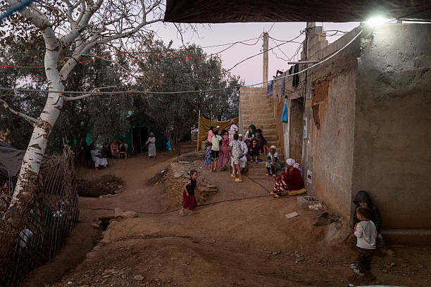 Marrakesh, Morocco – September 22, 2023: People stay in makeshift shelters and tents days after their homes were destroyed by the 2023 earthquake in Morocco.