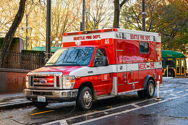 Photo of an red ambulance at a city street. Blurred motion. Urgency. Emergency