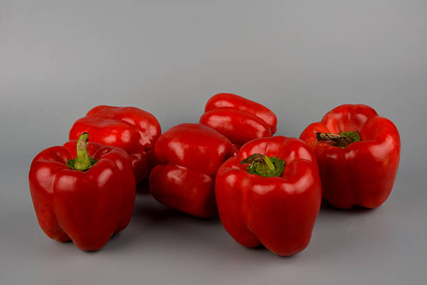 Big Fresh Red Healthy Sweet Pepper Vegetable Close up Cut on White Background,