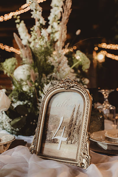 Table number vintage frame decoration at wedding reception