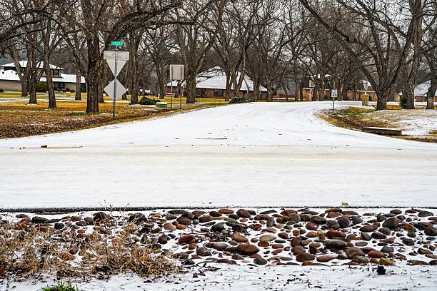 Icy winding roads make for dangerous driving in residential neighborhoods near Fort Worth, Texas, on January 24, 2026 . Copy Space.