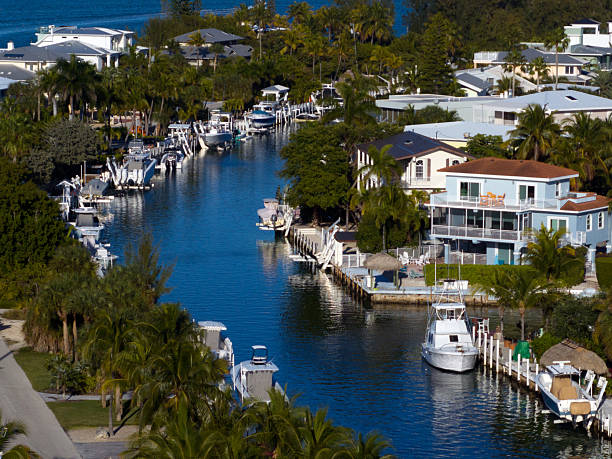 Sunset in the Florida Key with Boats, Docks and iconic sunsets. White Marlin Beach in Port Antigua, Florida
