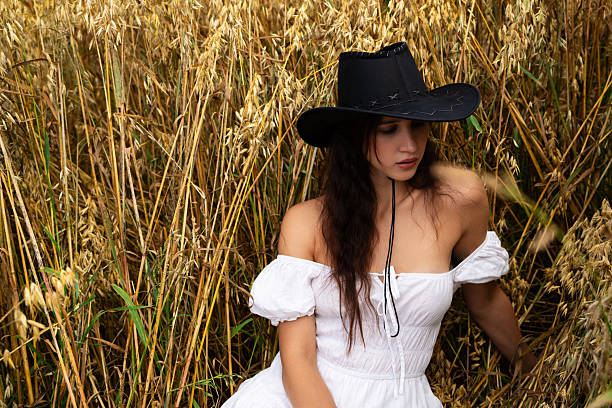Woman in wheat field.