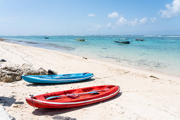 istock Two kayaks on a beach of white sand and turquoise waters 2258083103