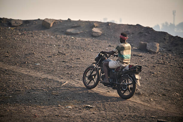 Man in the rearview mirror of a motorcycle