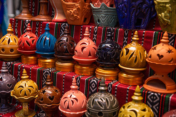 Middle Eastern souq bazaar with clay lantern incense burners at Muttrah market in Oman
