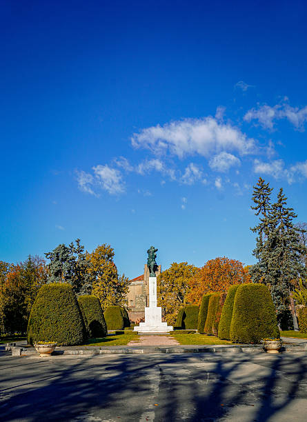 Historic Kalemegdan overlooking river confluence with Pobednik statue under clear blue sky in Belgrade